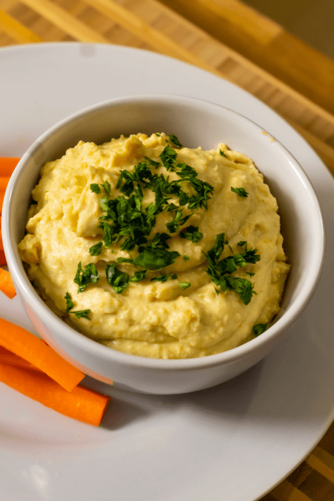 split pea hummus garnish with parsley