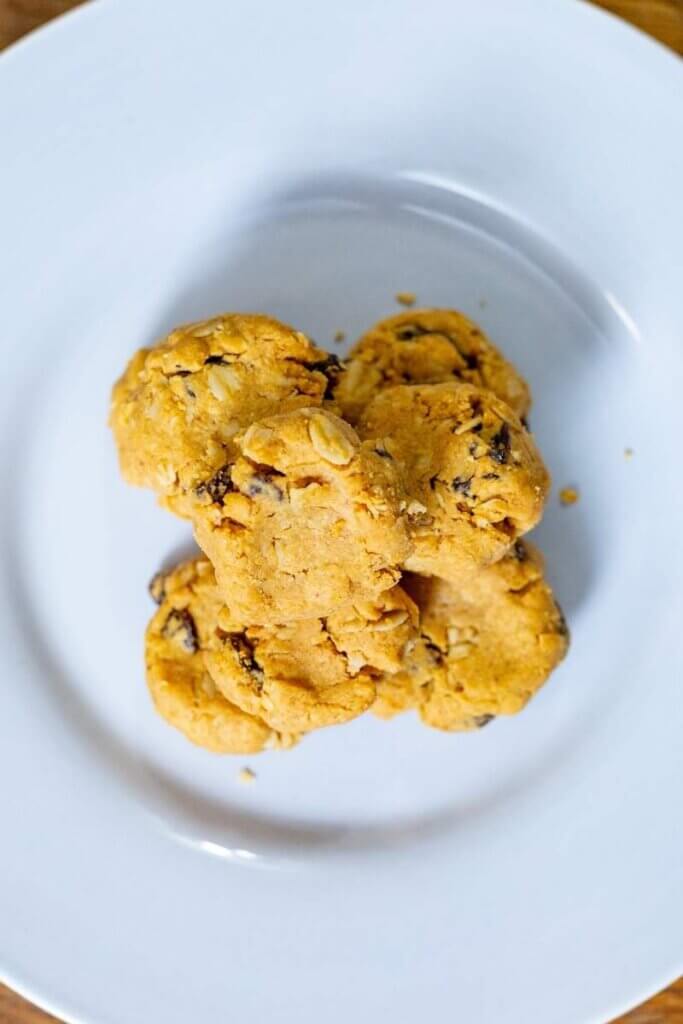 top shot of a stack of 4 ingredient oatmeal cookies on a white plate