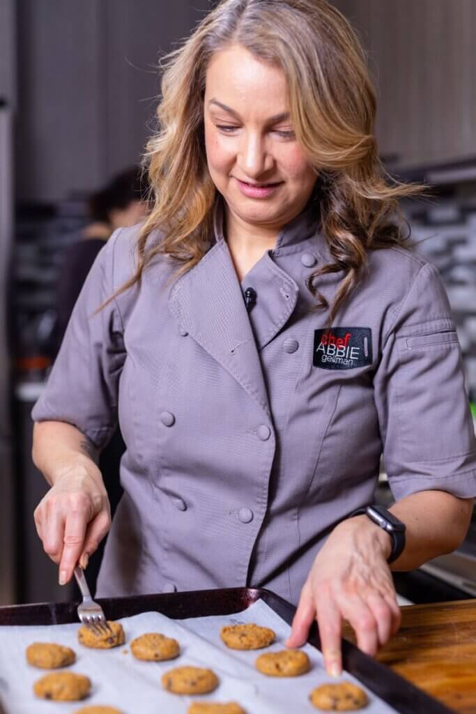making the criss cross on top of the cookies