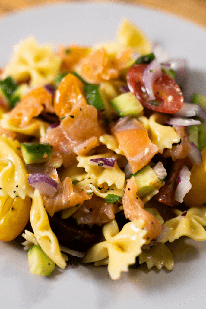 smoked salmon pasta in a large white bowl.