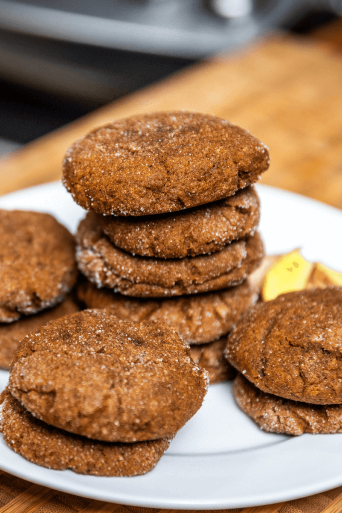 A plate of chewy ginger molasses cookies.