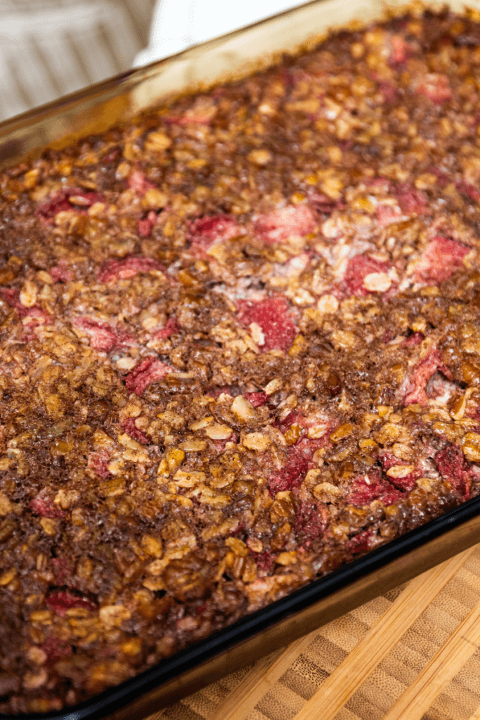 Baked strawberry oatmeal in a casserole dish.