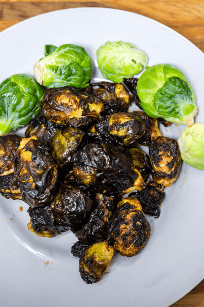 Roasted Maple Balsamic Brussels Sprouts on a plate. 